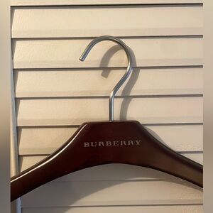 Set of 18 Burberry wooden hangers.